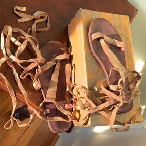 Gladiator sandals with shimmery golden features.